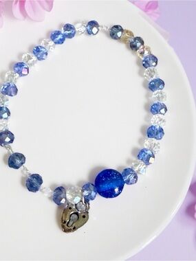 Hand Crafted Blue and Clear Beaded Necklace with Heart Charm